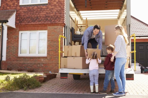 Professional moving team assisting with a commercial move
